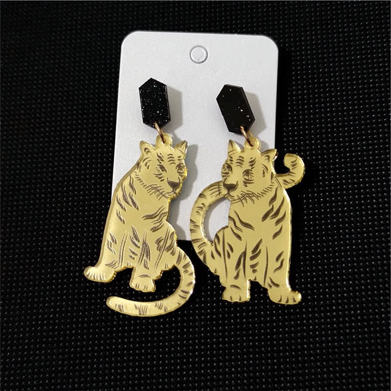 Aretes tigres dorados