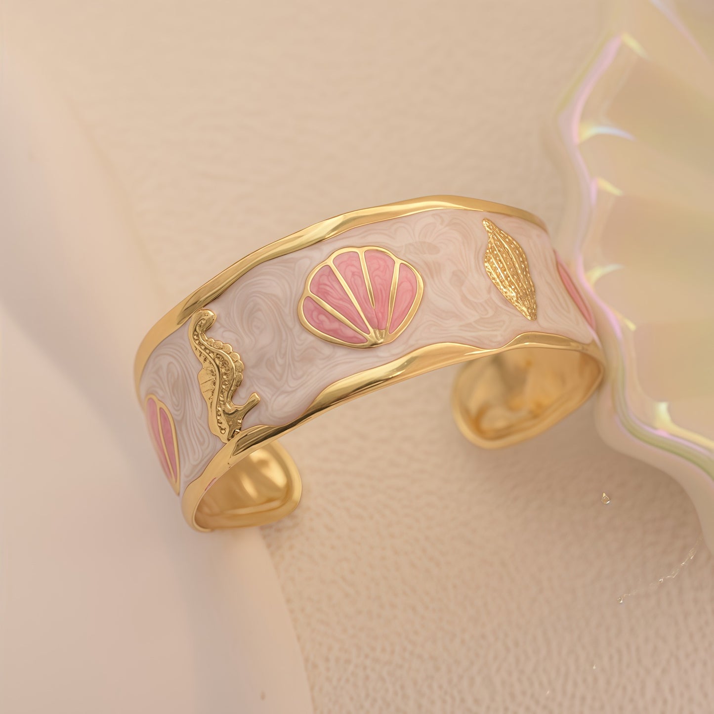 Brazalete conchitas rosadas- acero inoxidable