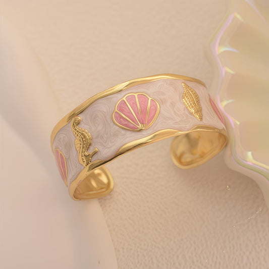 Brazalete conchitas rosadas- acero inoxidable