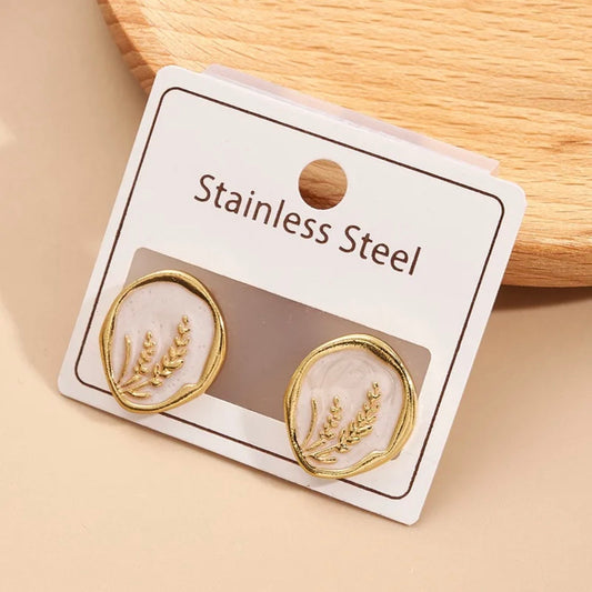 Aretes de hojitas- acero inoxidable