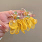 Aretes de flores amarillas