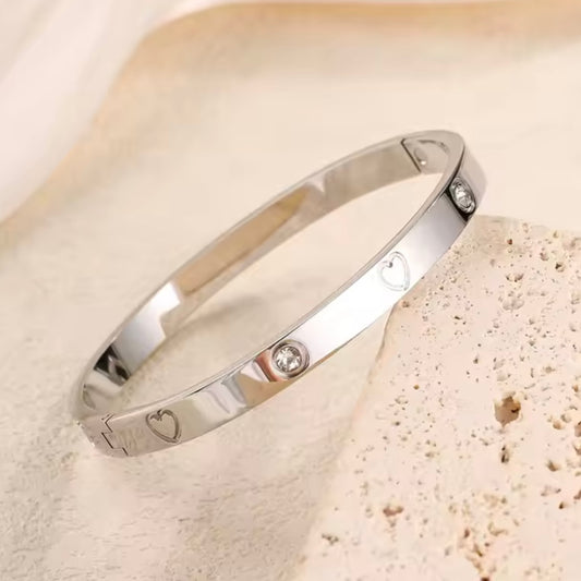 Pulsera corazón y pedrería acero inoxidable - plateada