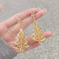 Aretes de arbolitos dorados