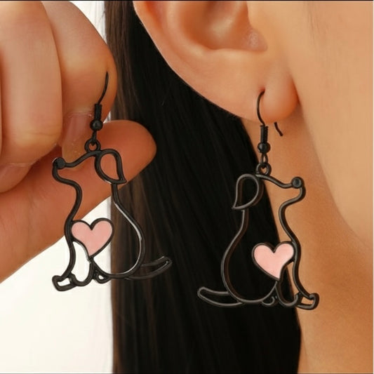 Aretes de perritos negros con corazón rosa