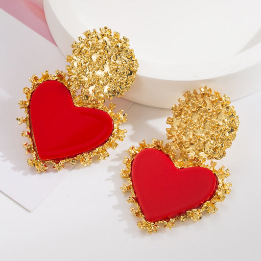 Aretes de corazones rojo con dorado