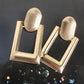 Aretes rectangulares dorados