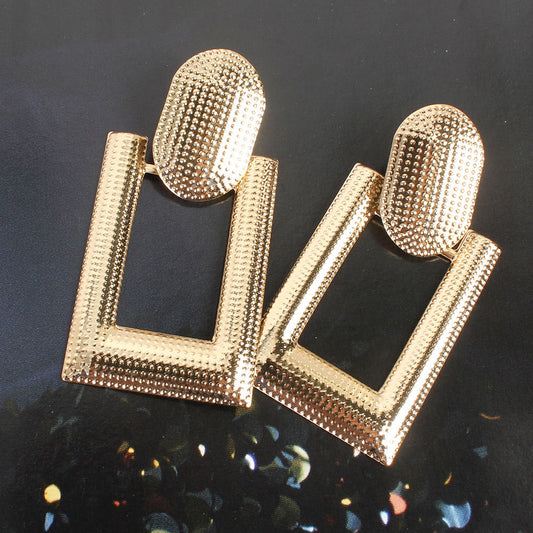 Aretes rectangulares dorados
