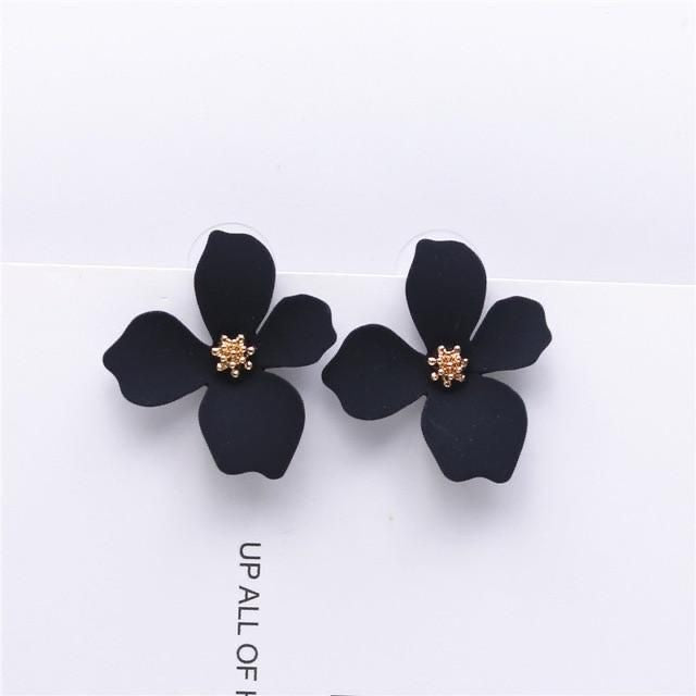 Aretes de florecitas negras