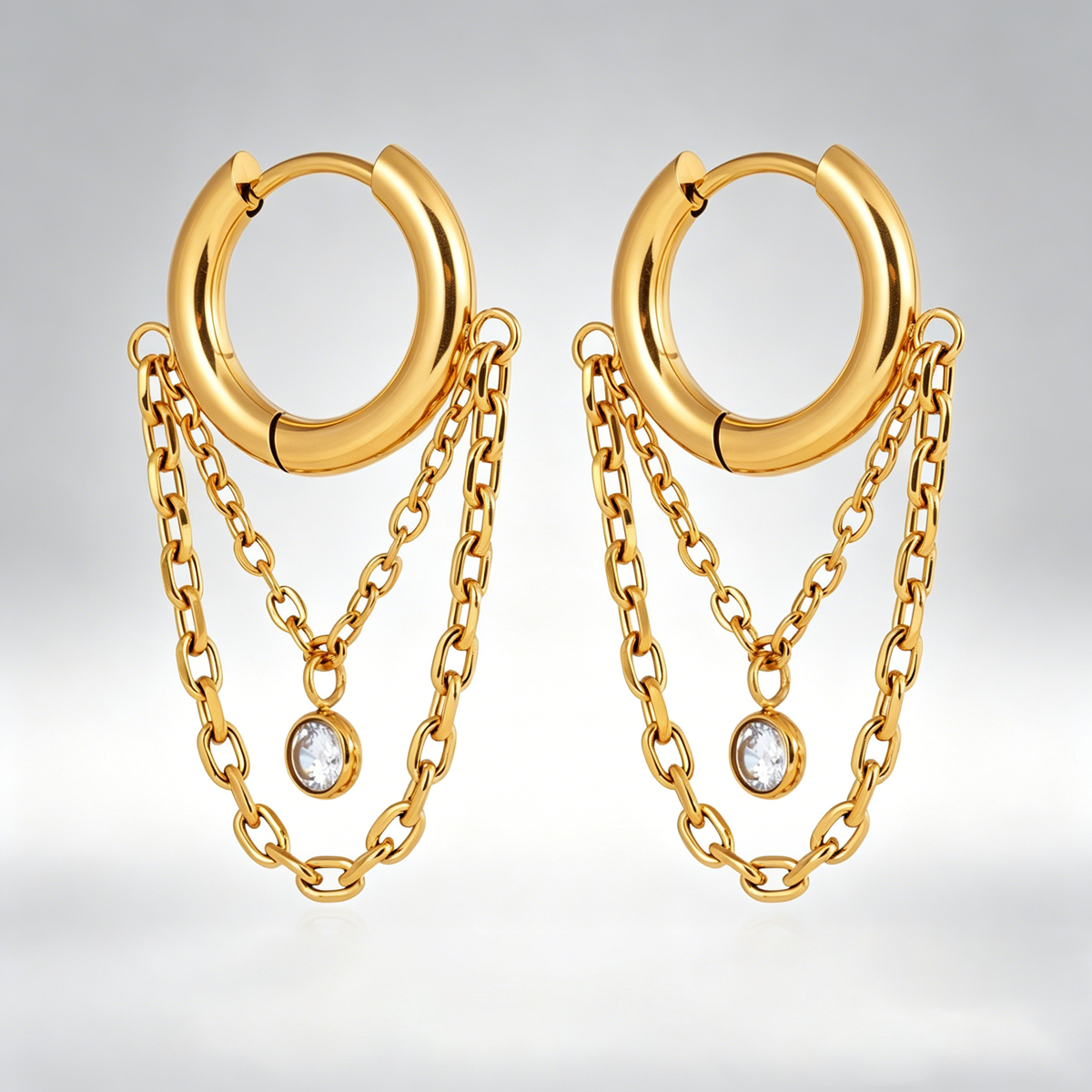 Aretes tipo Huggie con cadena - acero inoxidable