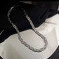 Collar trenza plateado - acero inoxidable