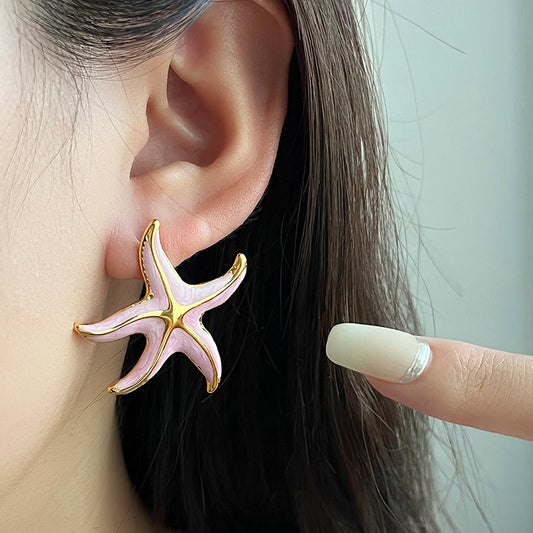 Aretes estrellas rosadas - acero inoxidable
