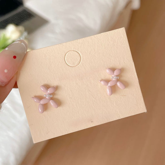 Aretes perrito globo rosados