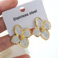 Aretes flores blancas- acero inoxidable