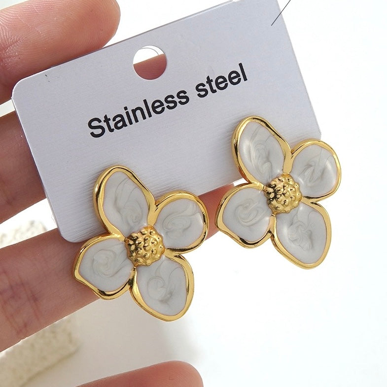 Aretes flores blancas- acero inoxidable