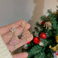 Aretes de arbolitos rosados