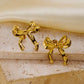 Aretes de lazos dorados - acero inoxidable