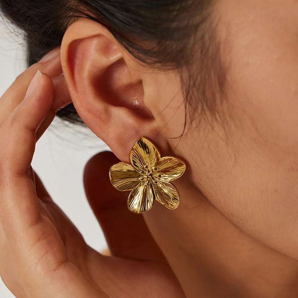 Aretes de flores de acero inoxidable
