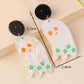 Aretes fantasmas flores verdes