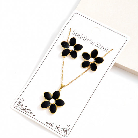 Set de collar + aretes flores negras - acero inoxidable
