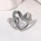 Anillo ajustable dos corazones plateado  / Acero inoxidable