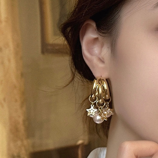 Aretes triple aro estrellas