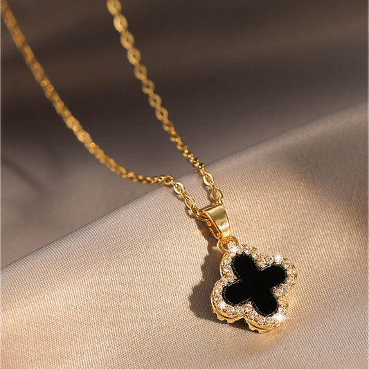 Collar flor doble vista blanco y negro   - acero inoxidable