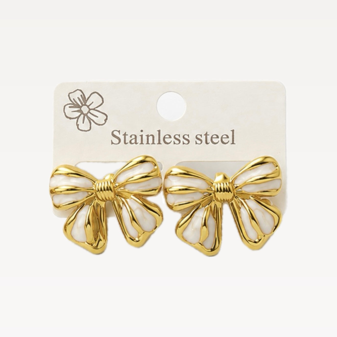 Aretes moños dorado y blanco - acero inoxidable