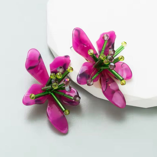 Aretes de flores moradas