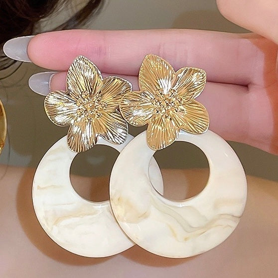 Aretes de flores doradas + nude- acero inoxidable