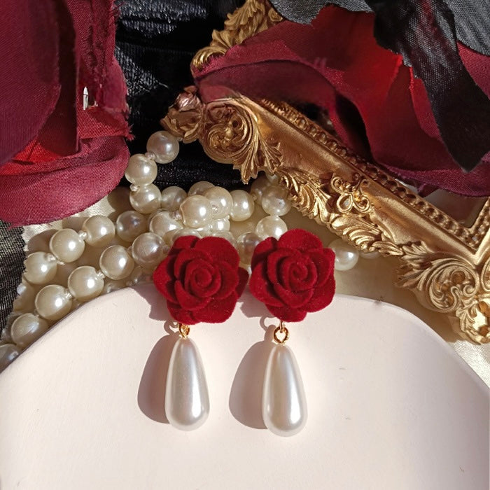 Aretes de flores de terciopelo