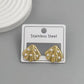 Aretes conchita con perlitas blancas - acero inoxidable