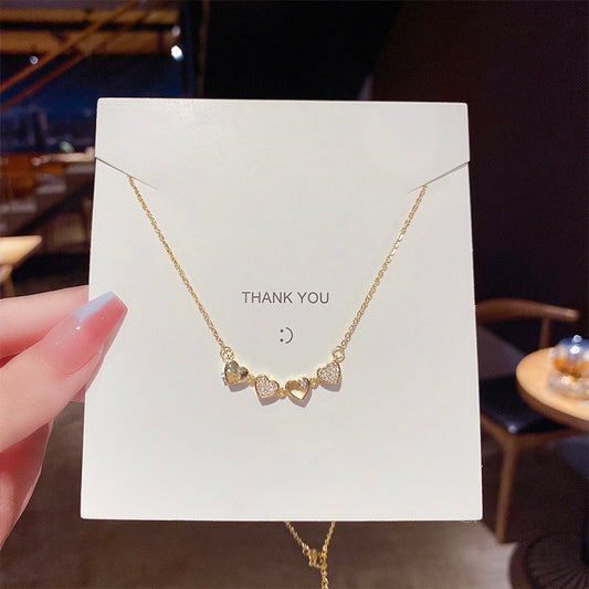 Collar 4 corazones dorados- acero inoxidable