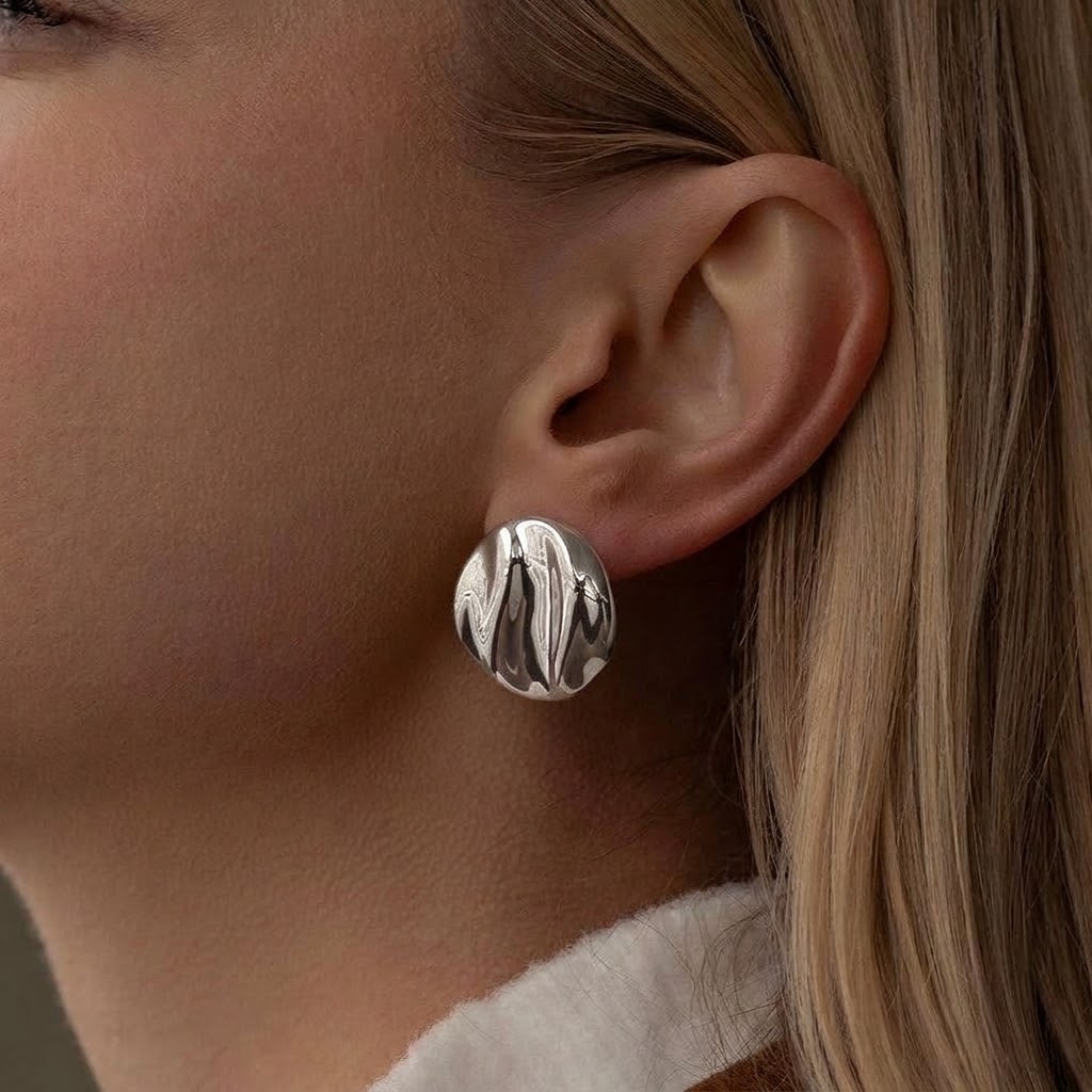 Aretes circulares plateados- acero inoxidable