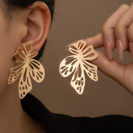 Aretes de flores doradas