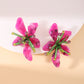 Aretes de flores moradas