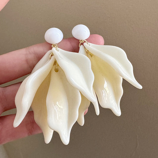 Aretes blancos