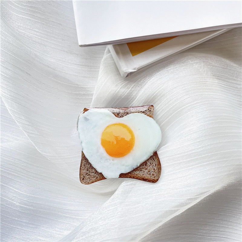 Popsocket- soporte de agarre para teléfono. Mod Huevito