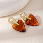 Aretes corazones carey