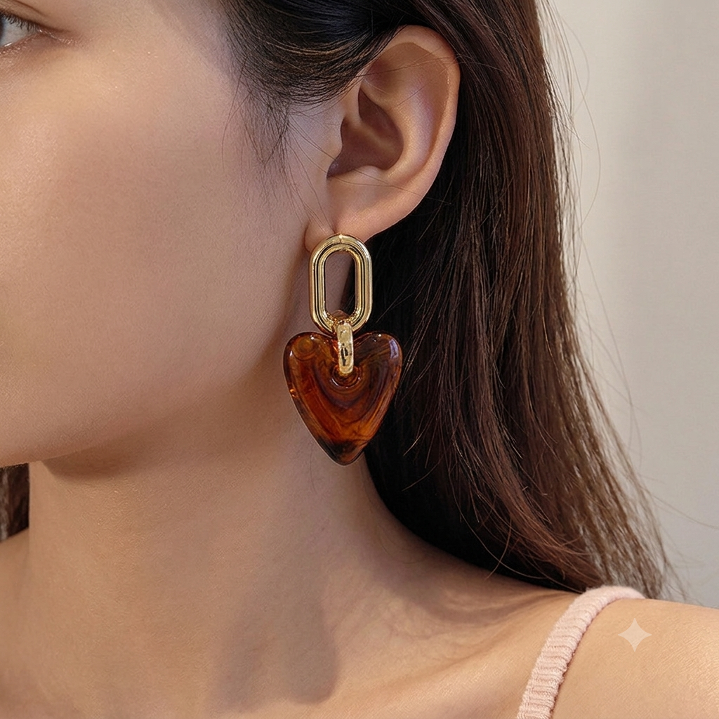 Aretes corazones carey