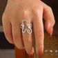 Anillo ajustable flor plateada  - acero inoxidable