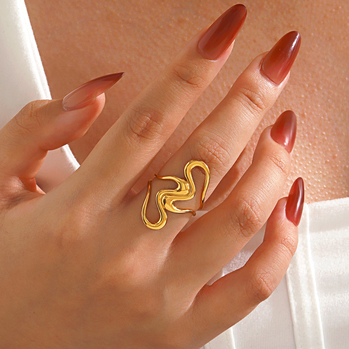 Anillo ajustable dorado- acero inoxidable