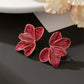 Aretes hojitas rojas - acero inoxidable
