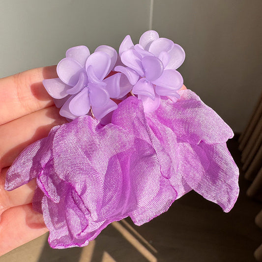 Aretes lilas