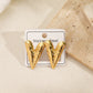 Aretes corazones con textura  - acero inoxidable