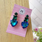 Aretes de corazón azul y verde