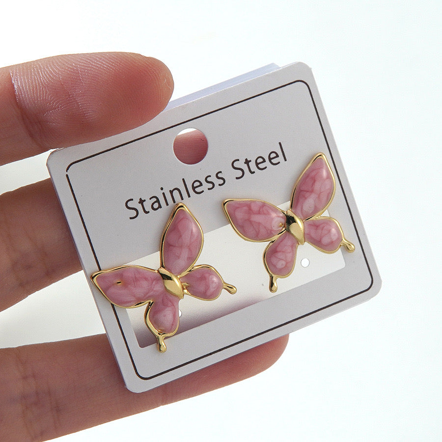 Aretes mariposas rosadas- acero inoxidable