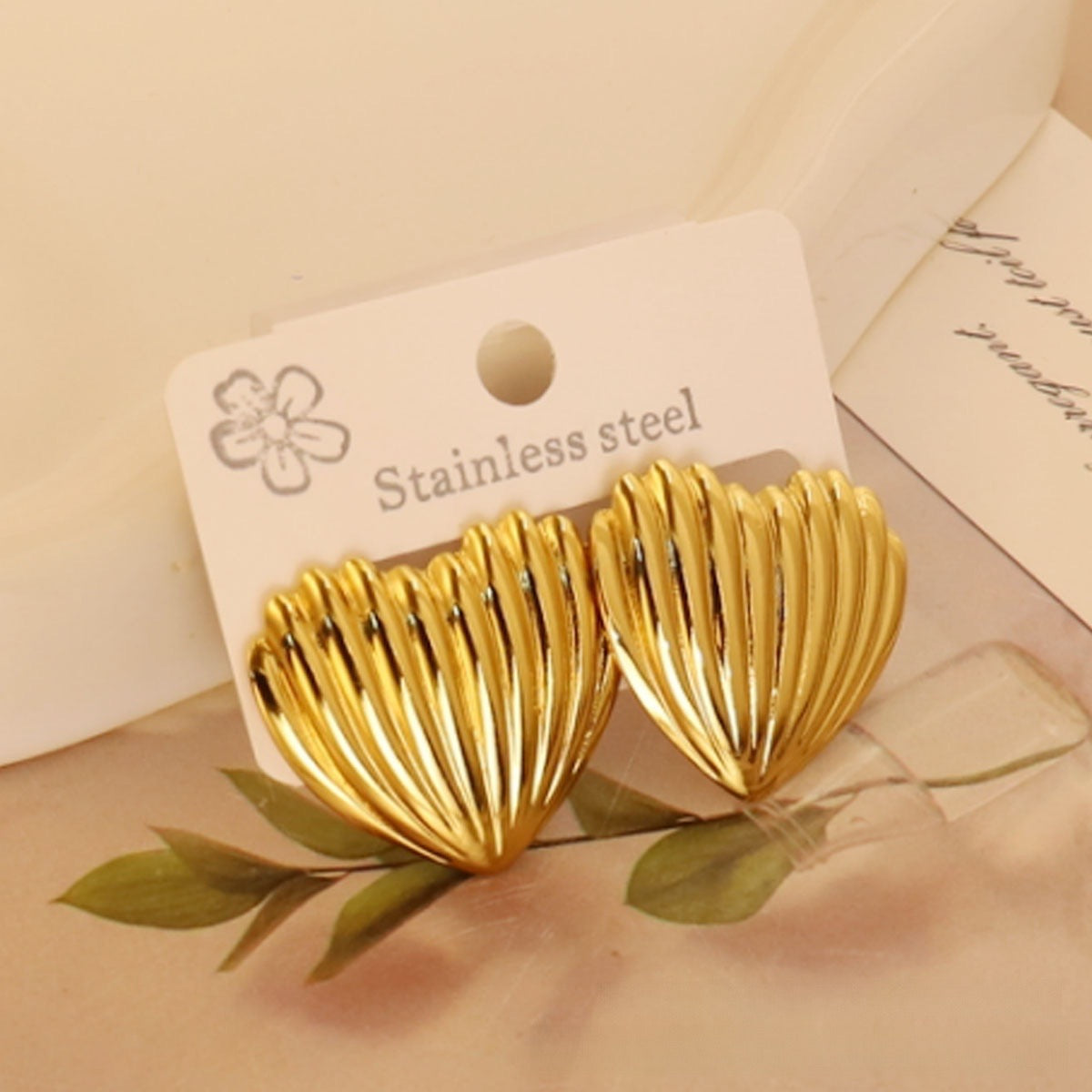 Aretes corazones con líneas  - acero inoxidable