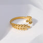 Anillo ajustable de hojas doradas - acero inoxidable